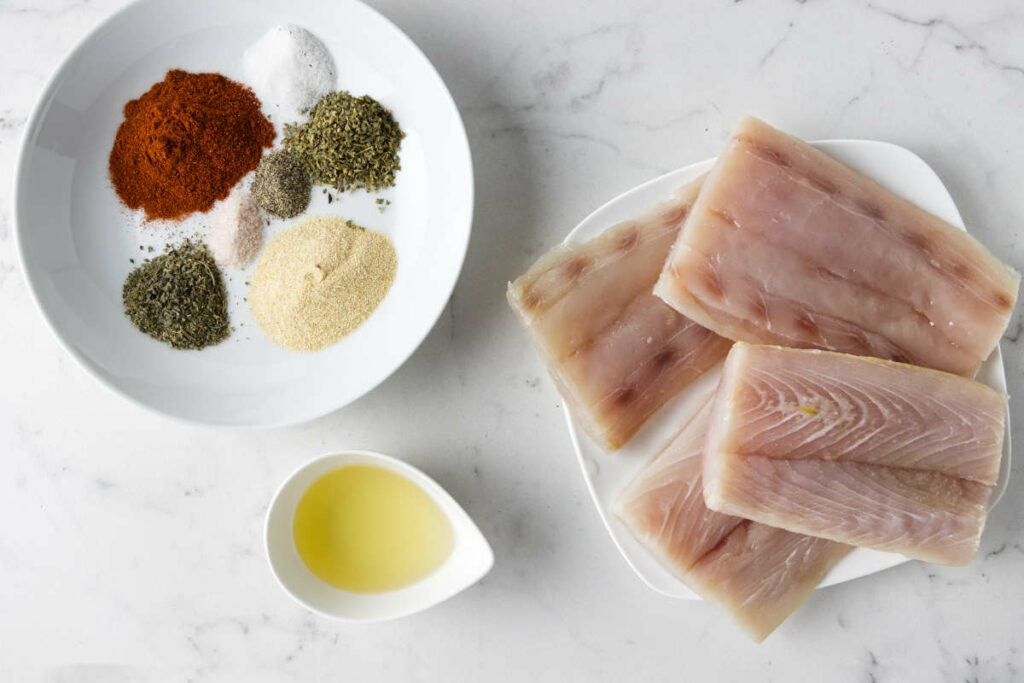 Mahi mahi fillets, oil, and spices for a blackening seasoning.