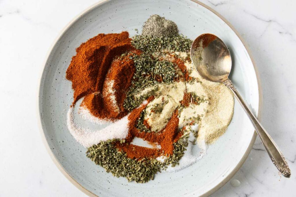 Spices for blackening seasoning: smoked paprika, garlic powder, onion powder, thyme, oregano, salt, pepper, cayenne.