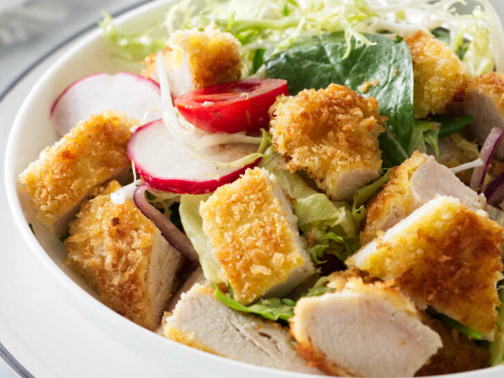 Plated serving of crispy chicken salad.