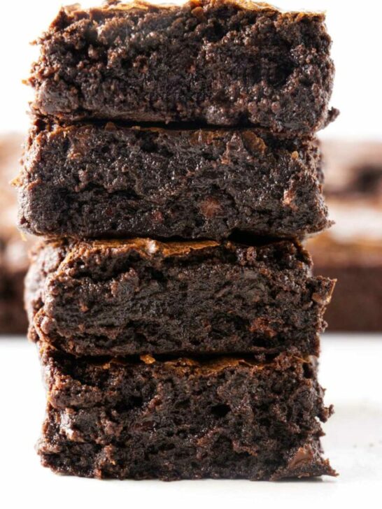 Four slices of sourdough brownies stacked on top of each other.