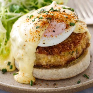 Crab cake eggs benedict with hollandaise sauce.