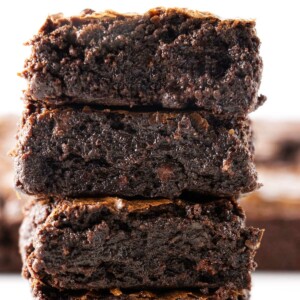 Three sourdough brownies stacked on top of each other.