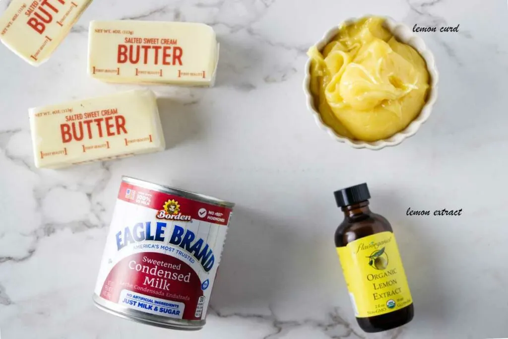 Ingredients for lemon Russian buttercream: butter, lemon curd, lemon extract, and sweetened condensed milk.