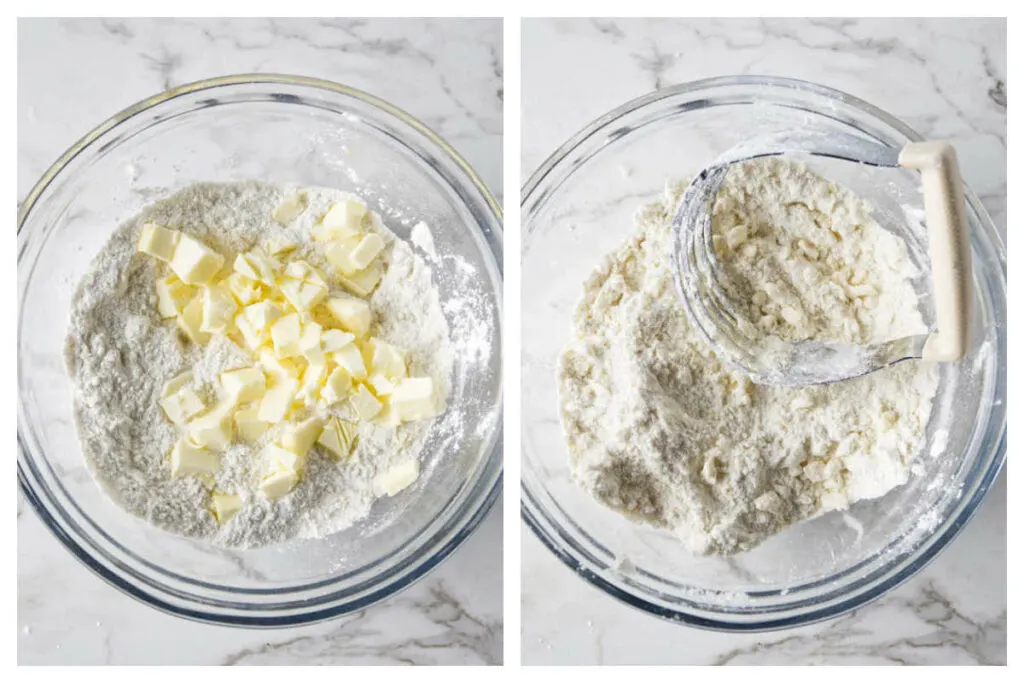 Adding cold butter to the flour mixture and blending it with a pastry blender.
