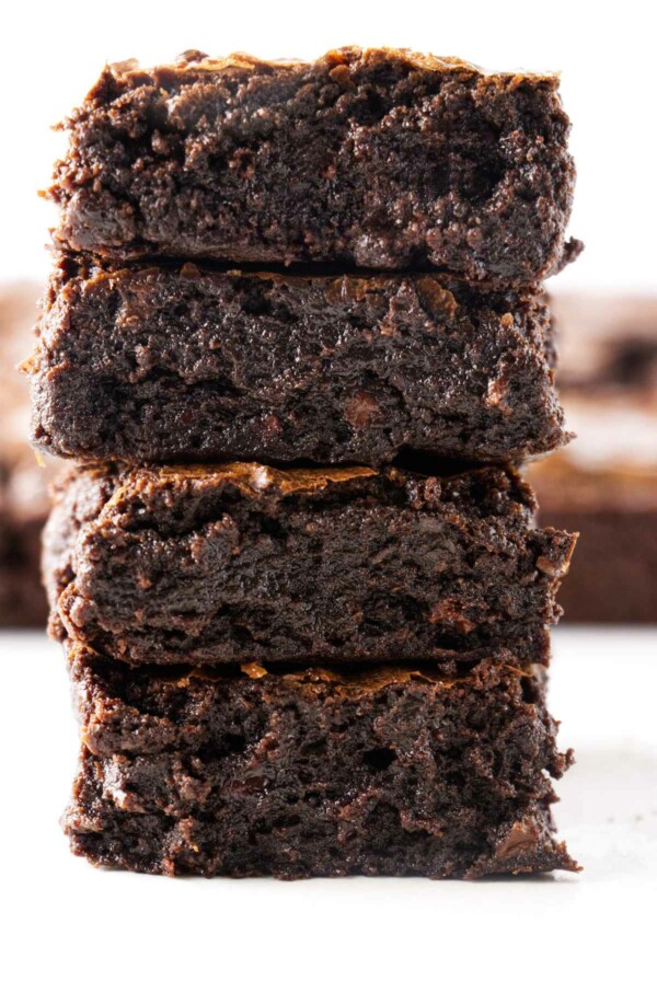 Four slices of sourdough brownies stacked on top of each other.