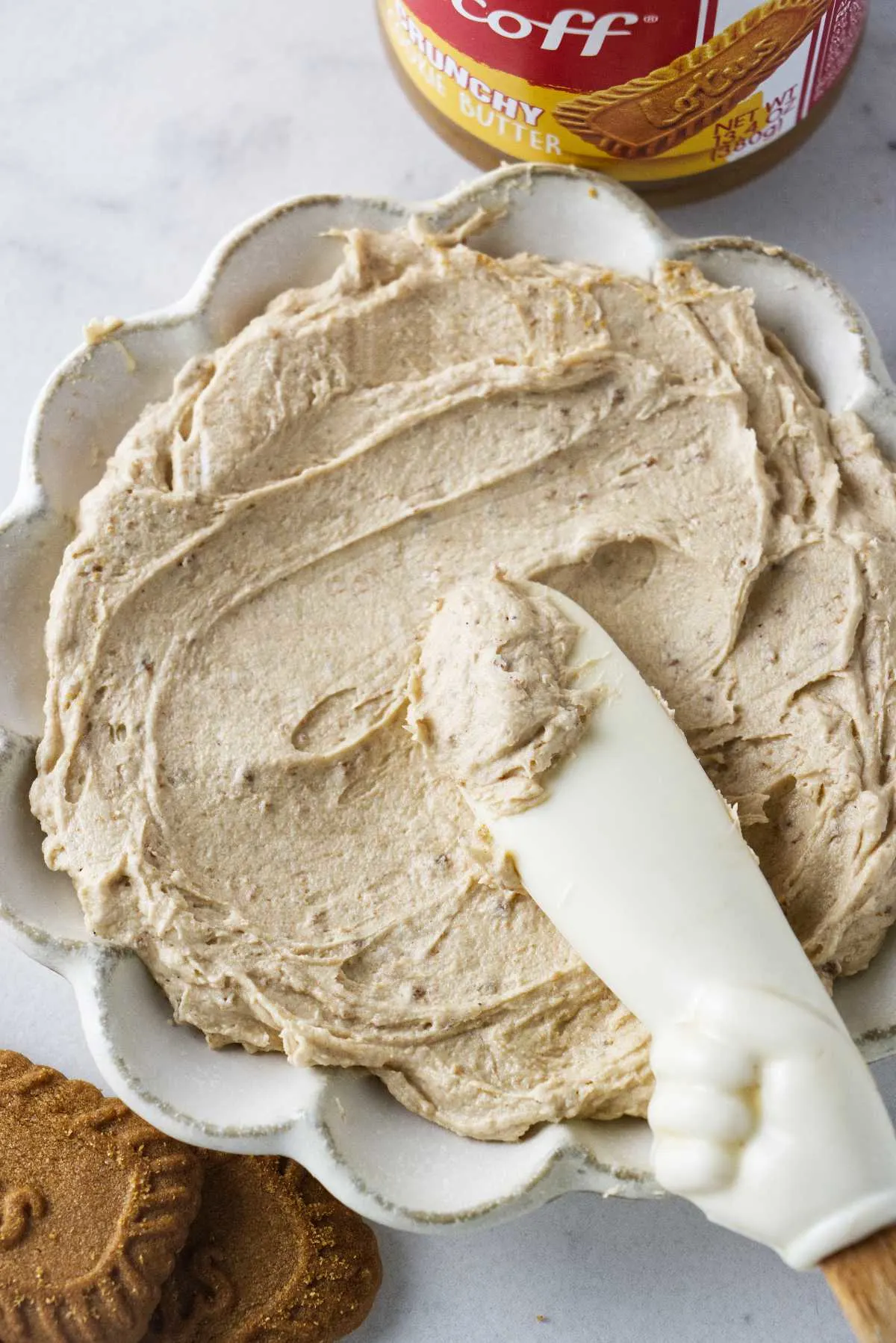 A dish filled with biscoff buttercream.