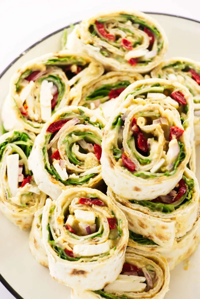 Mediterranean pinwheel wraps for easy party appetizers.