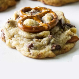 A salted caramel pretzel cookie with a pretzel on top.