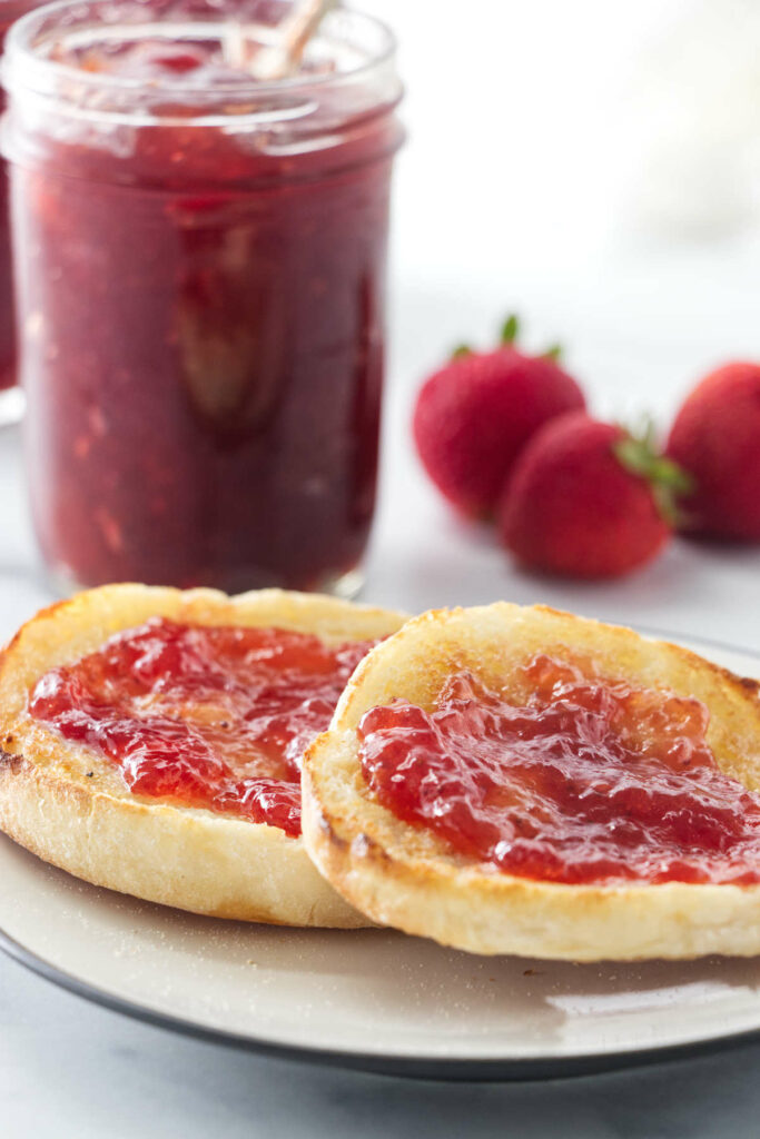 Homemade jam made with fresh strawberries on toast.