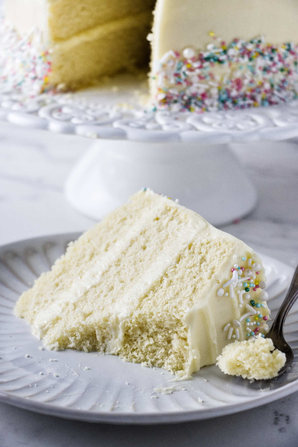 https://savorthebest.com/wp-content/uploads/2023/08/vanilla-cake-with-cream-cheese-frosting_4976.jpg