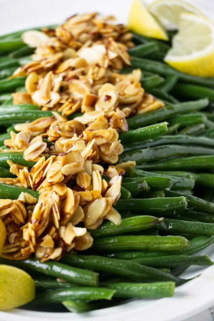 Toasted almonds and brown butter on top of freshly cooked green beans.