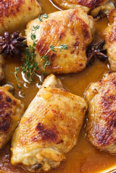Star anise chicken in a skillet.