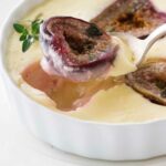 Goat cheese custard in a small ramekin dish with figs.