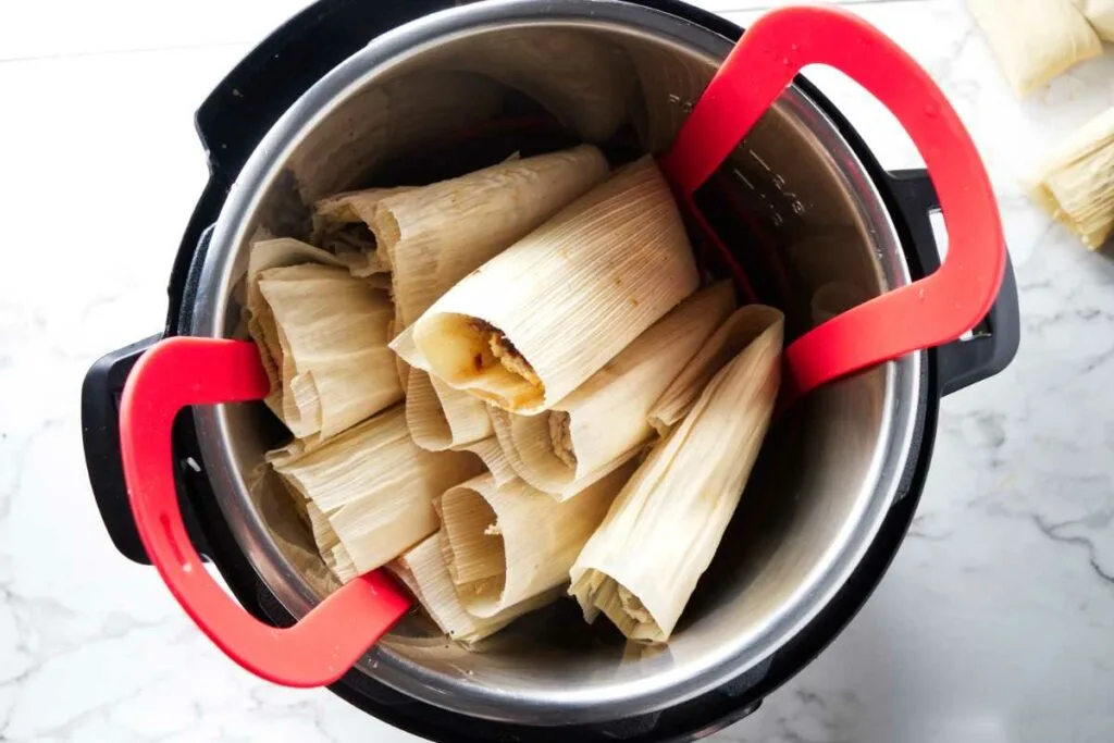 Several tamales in an Instant Pot.