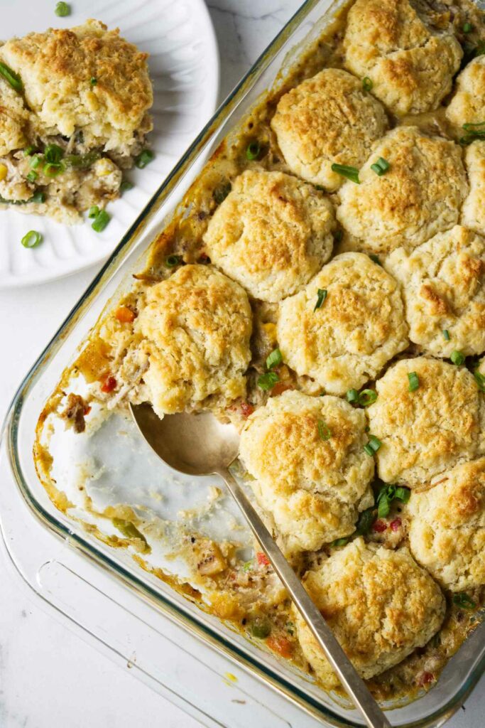 A pot pie casserole made with leftover pork and topped with biscuits.