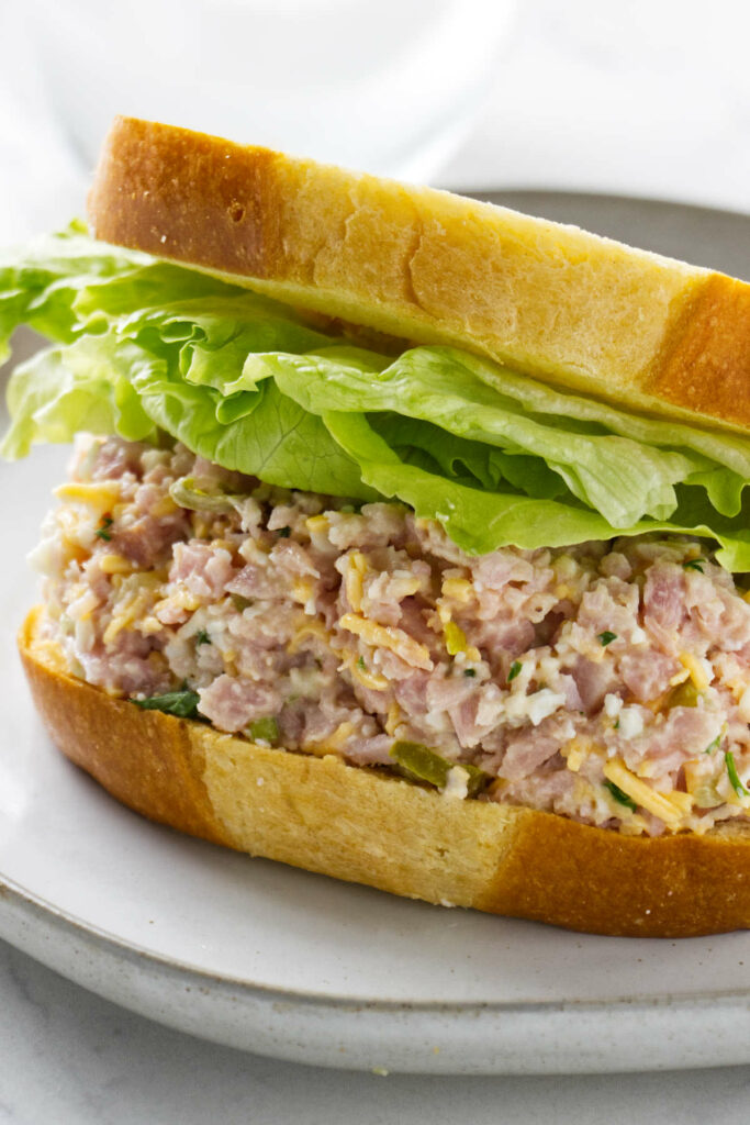 A ham salad sandwich on white bread.