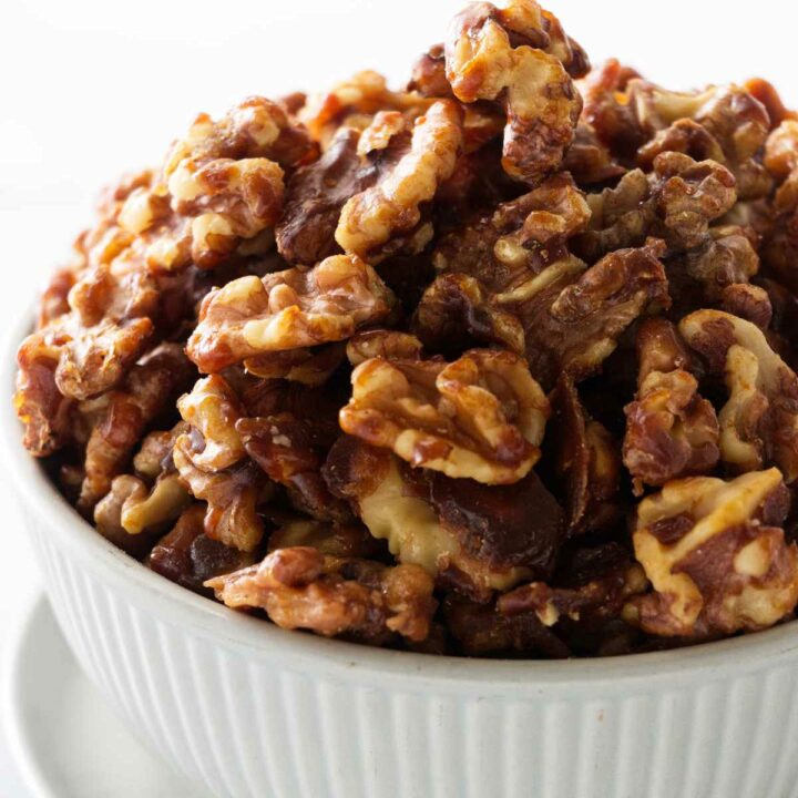 A bowl of candied walnuts.