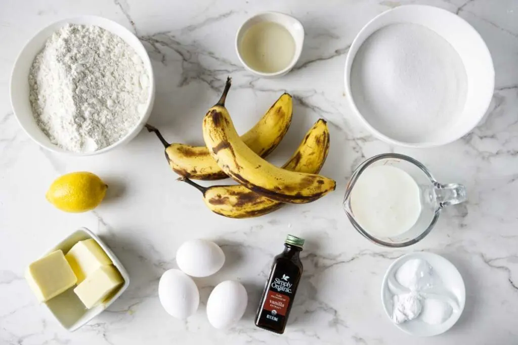 Ingredients needed to make a lemon banana cake.