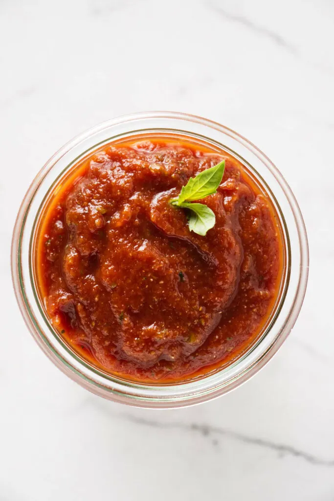 Tomato paste pizza sauce in a jar.