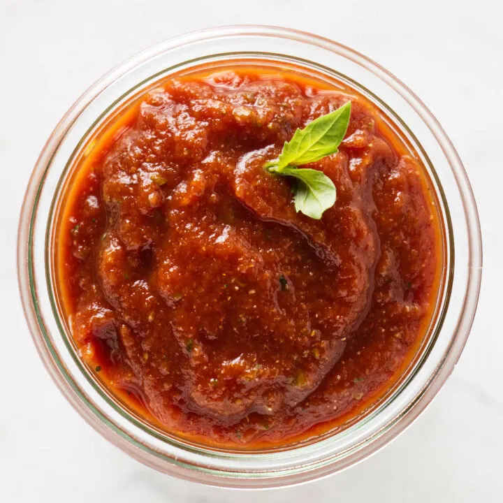 Homemade pizza sauce made with tomato paste and pantry ingredients.