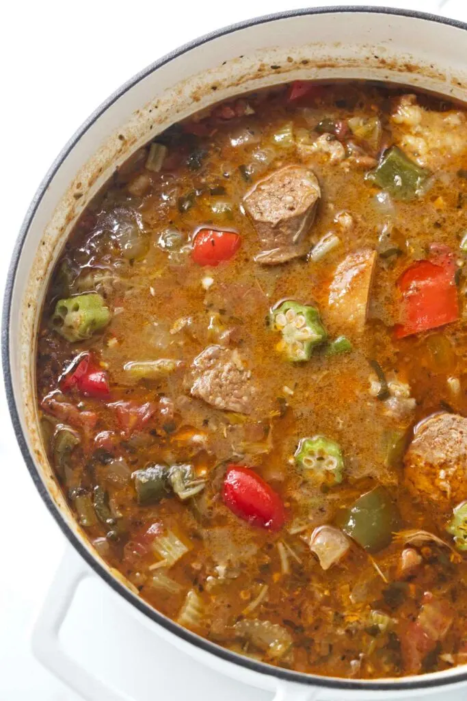 A large pot of chicken and sausage gumbo.