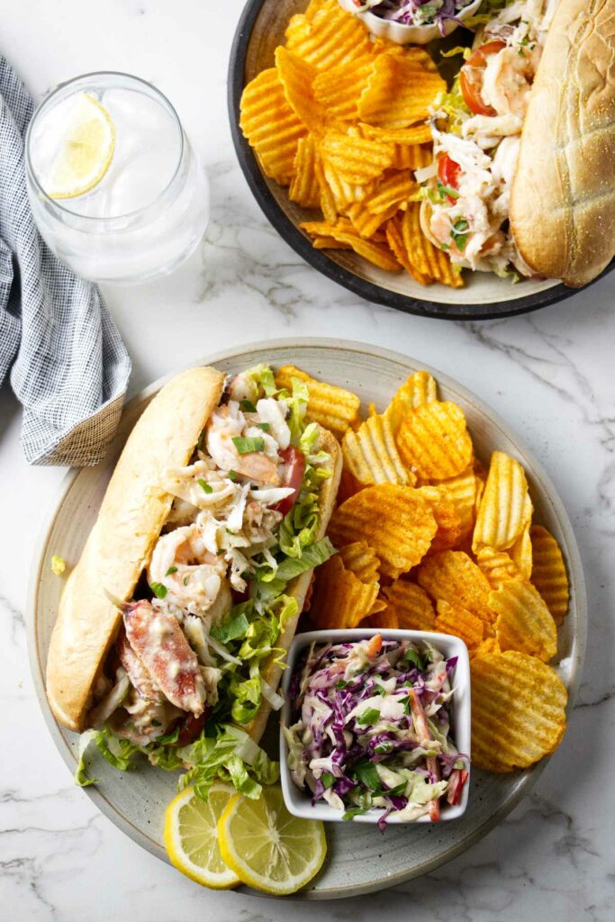Two po boys made with shrimp and crab salad.