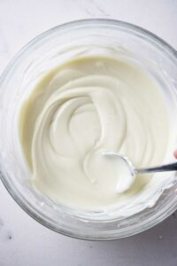 Melting white chocolate in a bowl.