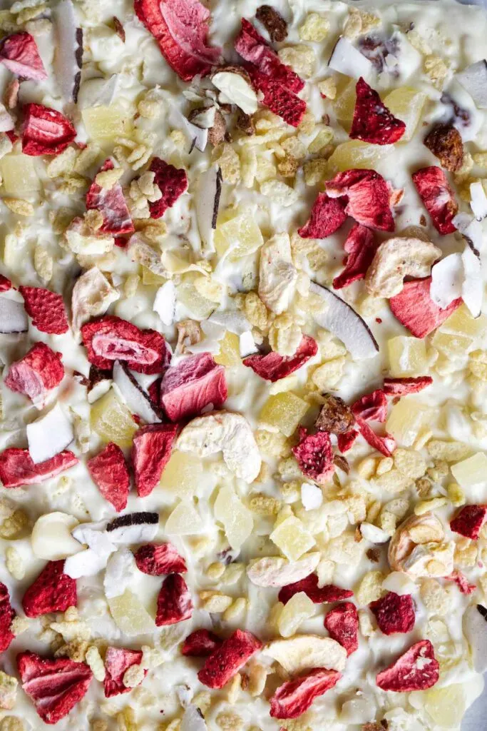 White chocolate bark with dried strawberries, coconut, dried pineapple, and nuts.