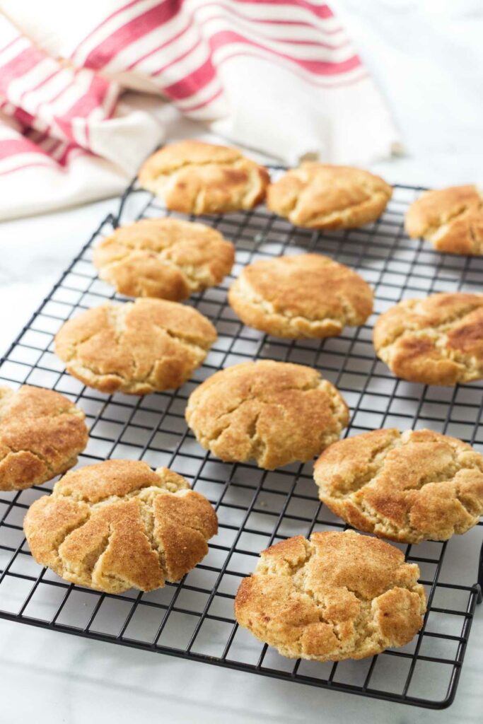 Brown butter snickerdoodles on a cooling rack.