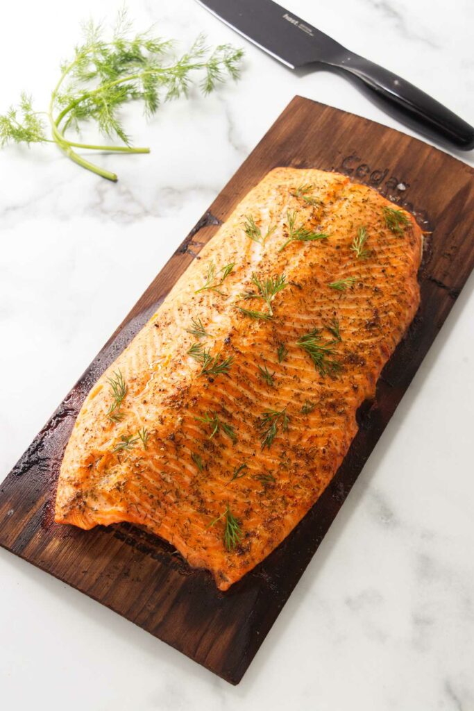 A trout baked on a cedar plank.