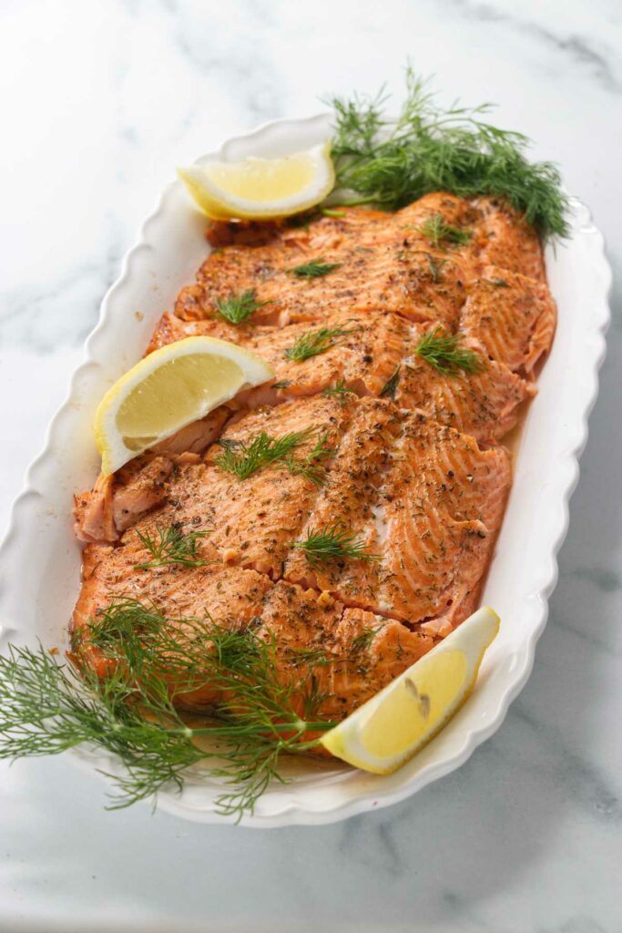 A steelhead trout baked on a cedar plank.