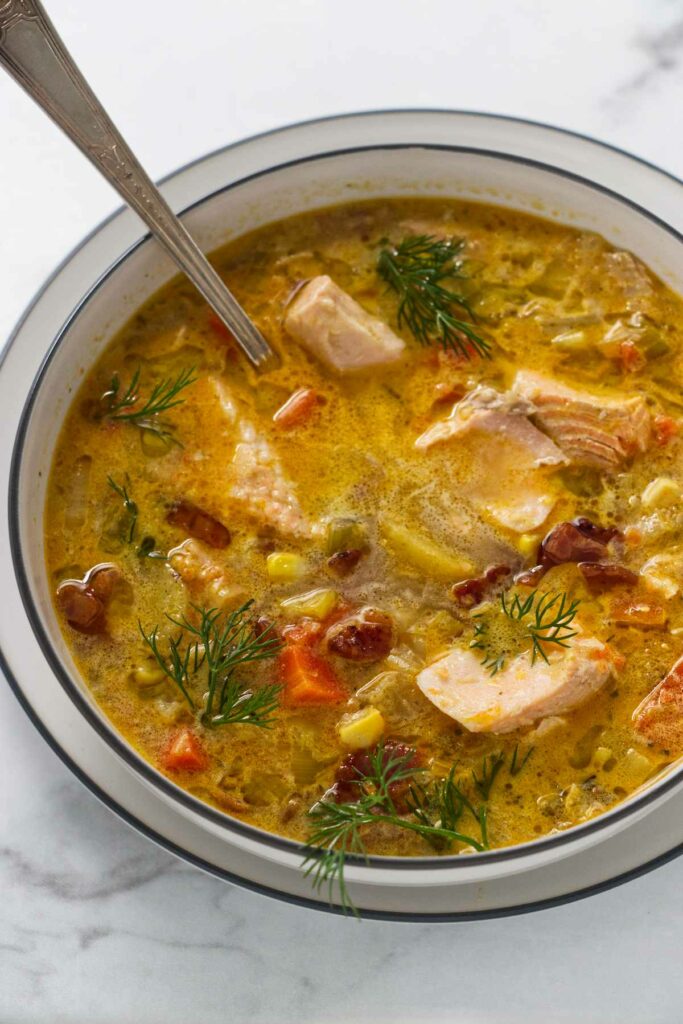 A bowl of chowder with smoked trout.