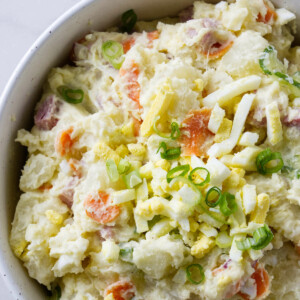 A dish filled with Japanese potato salad made with Kewpie mayonnaise.