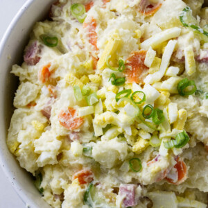 A serving bowl filled with Japanese potato salad.