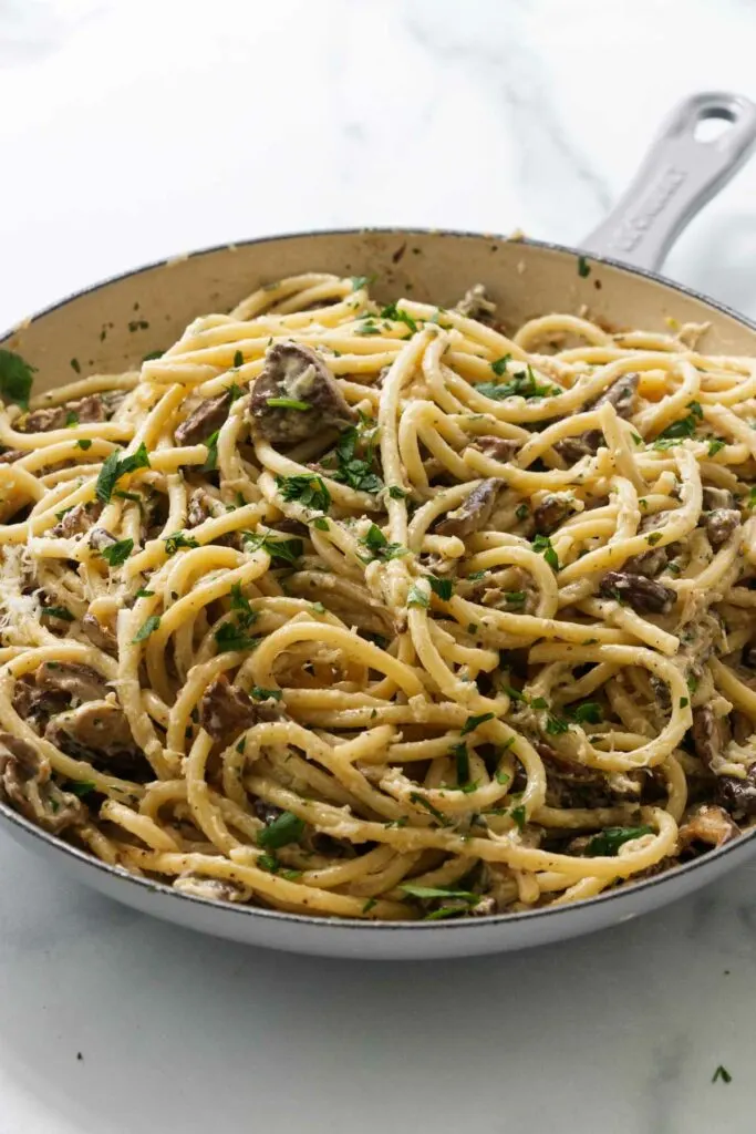 Wild mushroom pasta in a skillet.