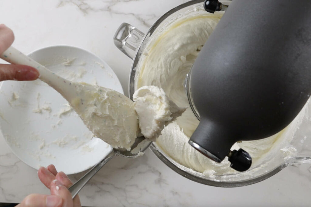 Combining the cooked flour mixture and the creamed butter.