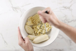 Mashing bananas for starbucks banana nut bread.