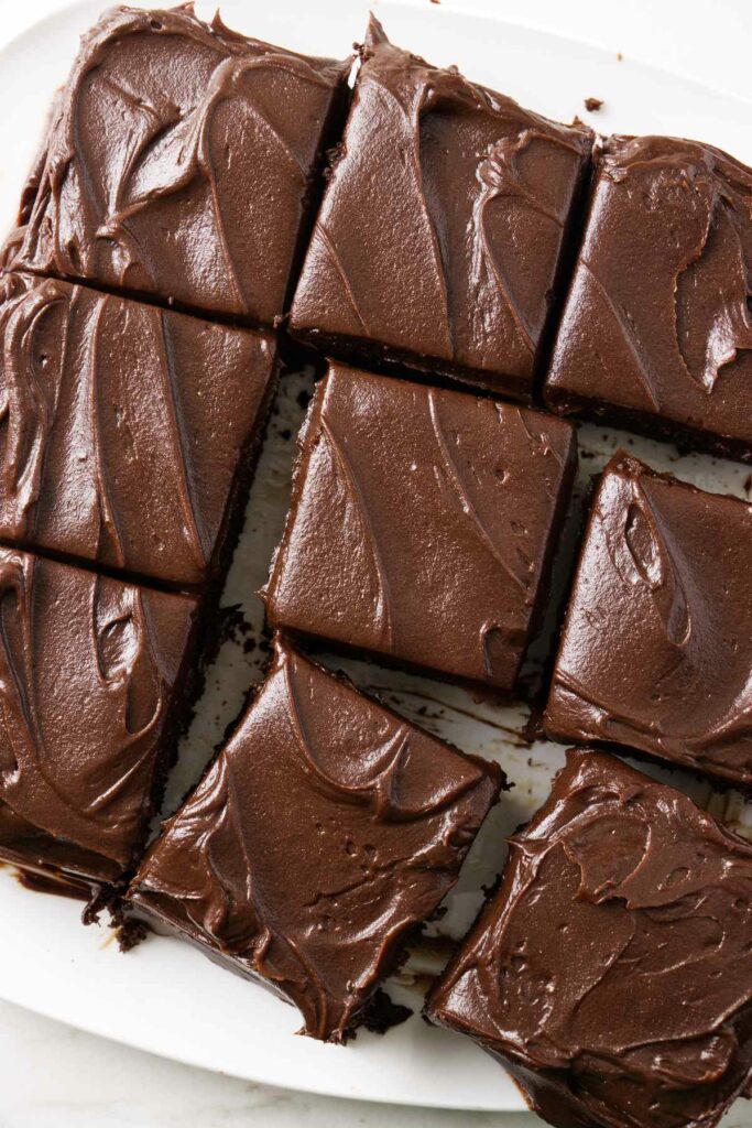 Several slices of of einkorn chocolate cake on a platter.