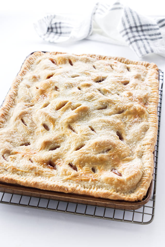 A freshly baked cookie sheet apple pie.