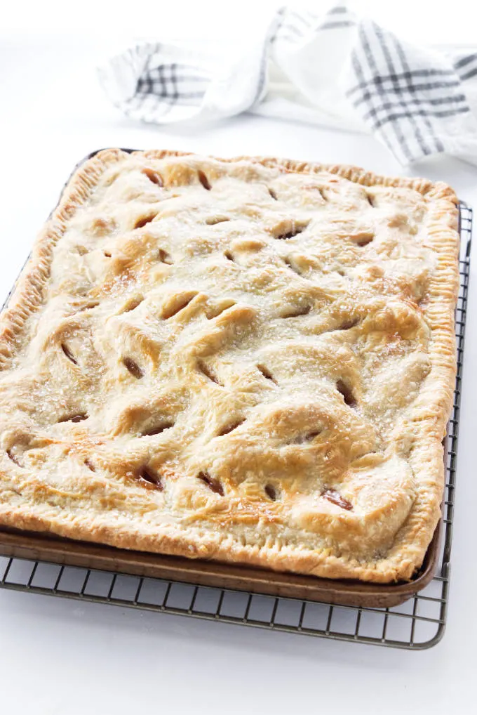 A freshly baked cookie sheet apple pie.