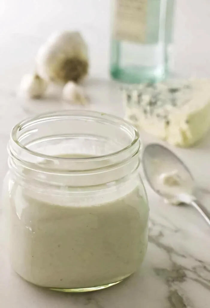 Cottage cheese blue cheese salad dressing in a jar.