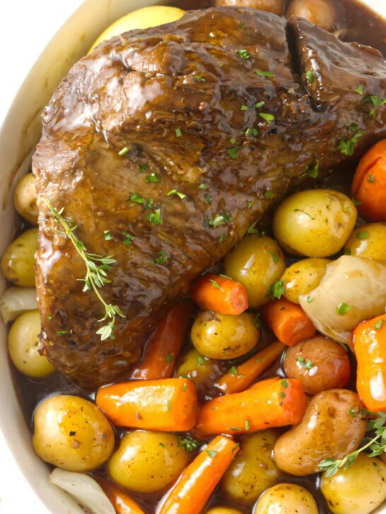 Instant pot tri tip and vegetables in a serving dish.