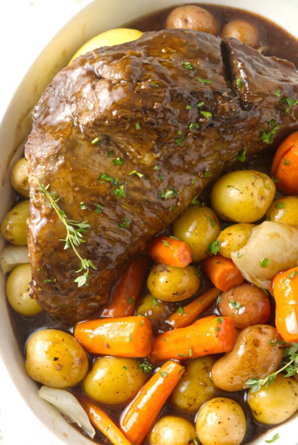 Instant pot tri tip and vegetables in a serving dish.