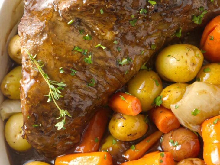 Instant pot tri tip and vegetables in a serving dish.