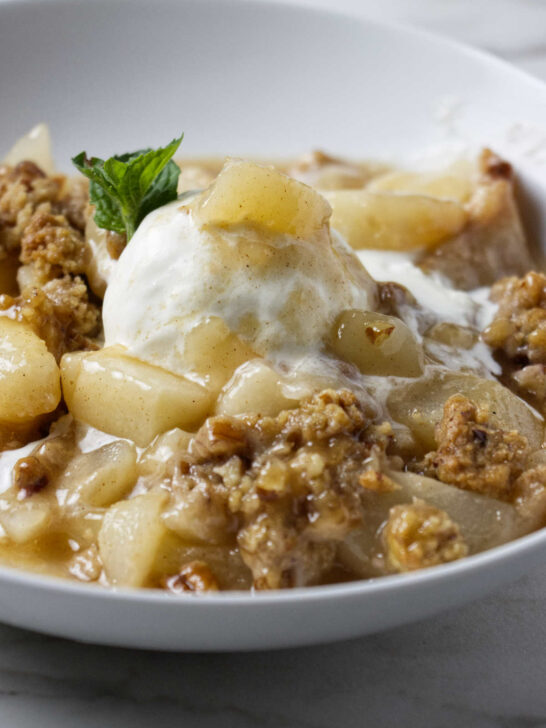 A warm pear crisp with fresh pears.