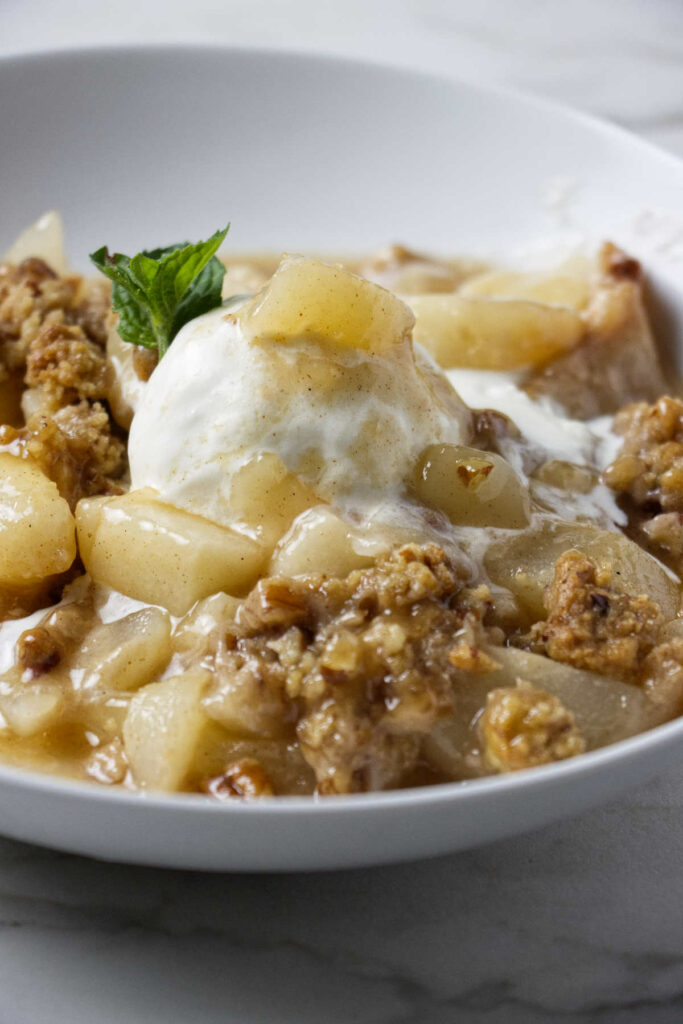 A warm pear crisp with fresh pears.