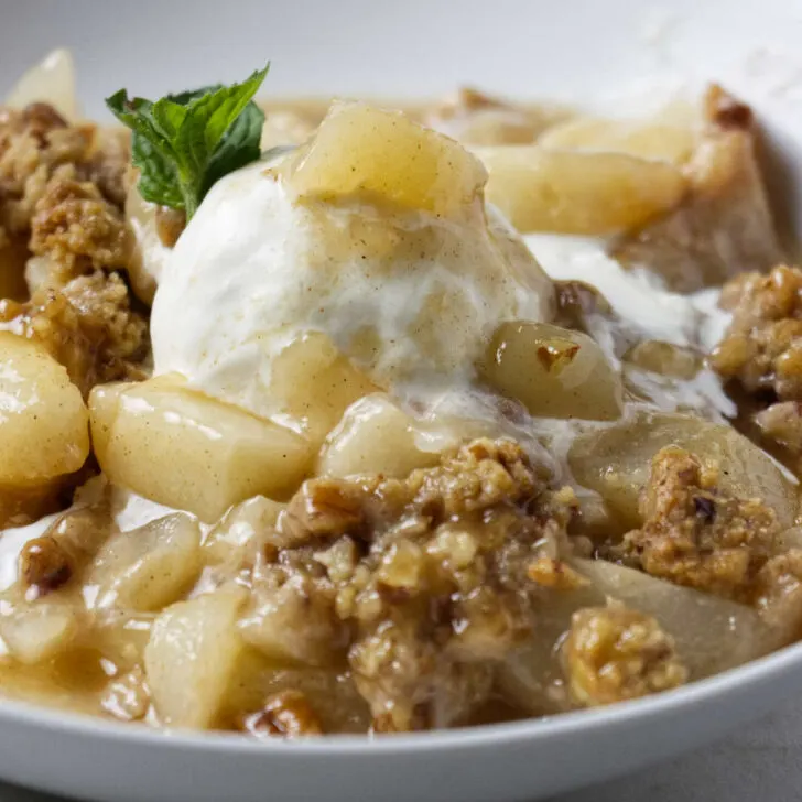 A warm pear crisp with fresh pears.