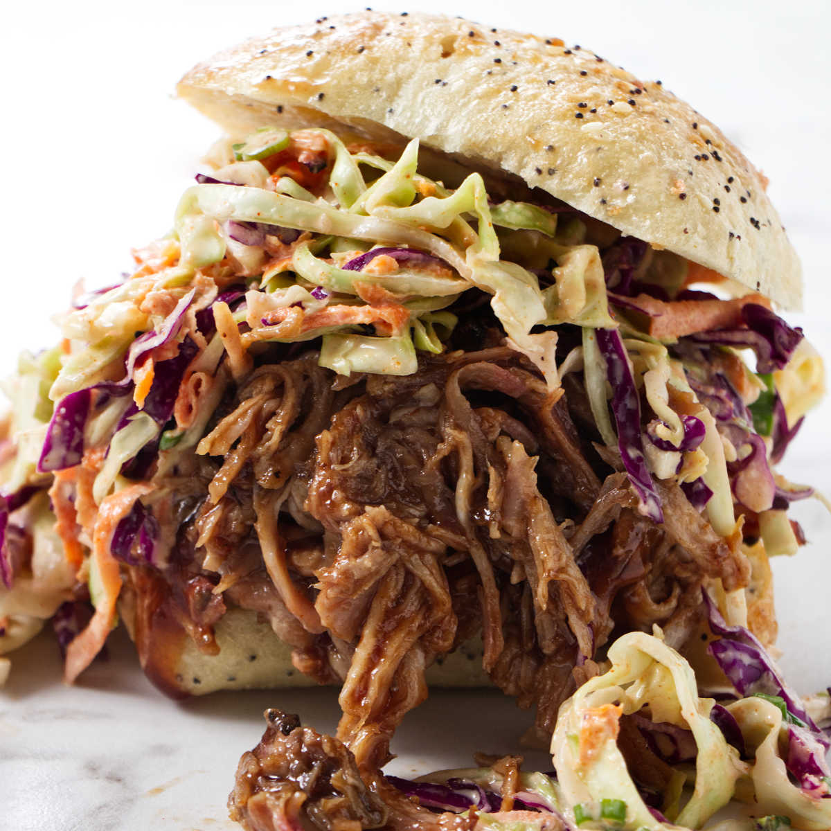 A sandwich made with the slow cooker bbq pulled pork recipe.