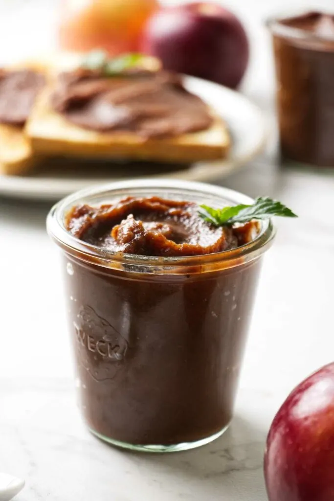 A jar of apple butter sugar free made in the crockpot.