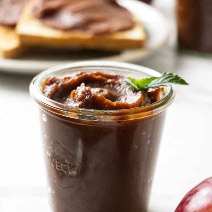 A jar of apple butter sugar free made in the crockpot.